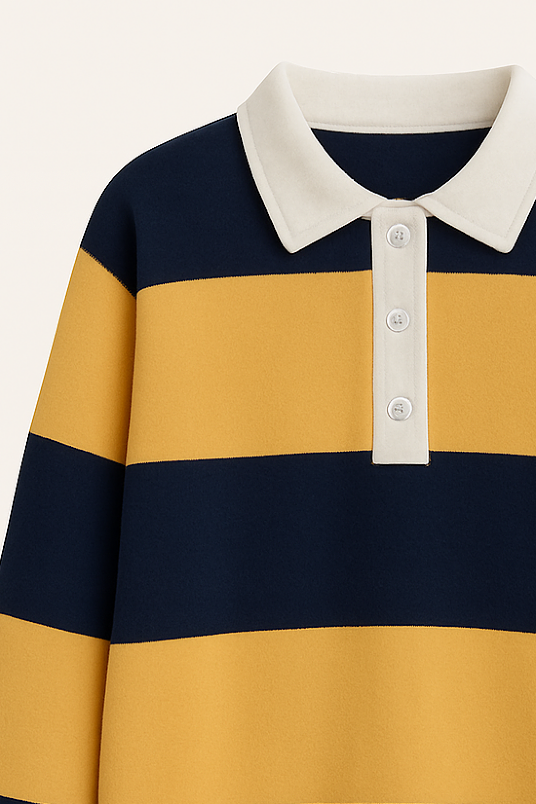 Close-up of a yellow and navy striped shirt with a white collar and buttons.