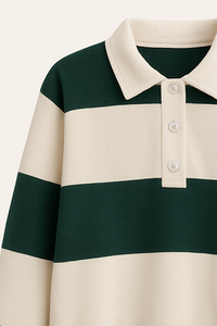 Close-up of a green and beige striped polo shirt on a white background